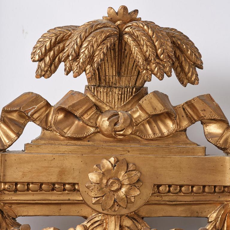 A Gustavian Giltwood mirror by J. Åkerblad and A. Öberg, Stockholm, 1780's.