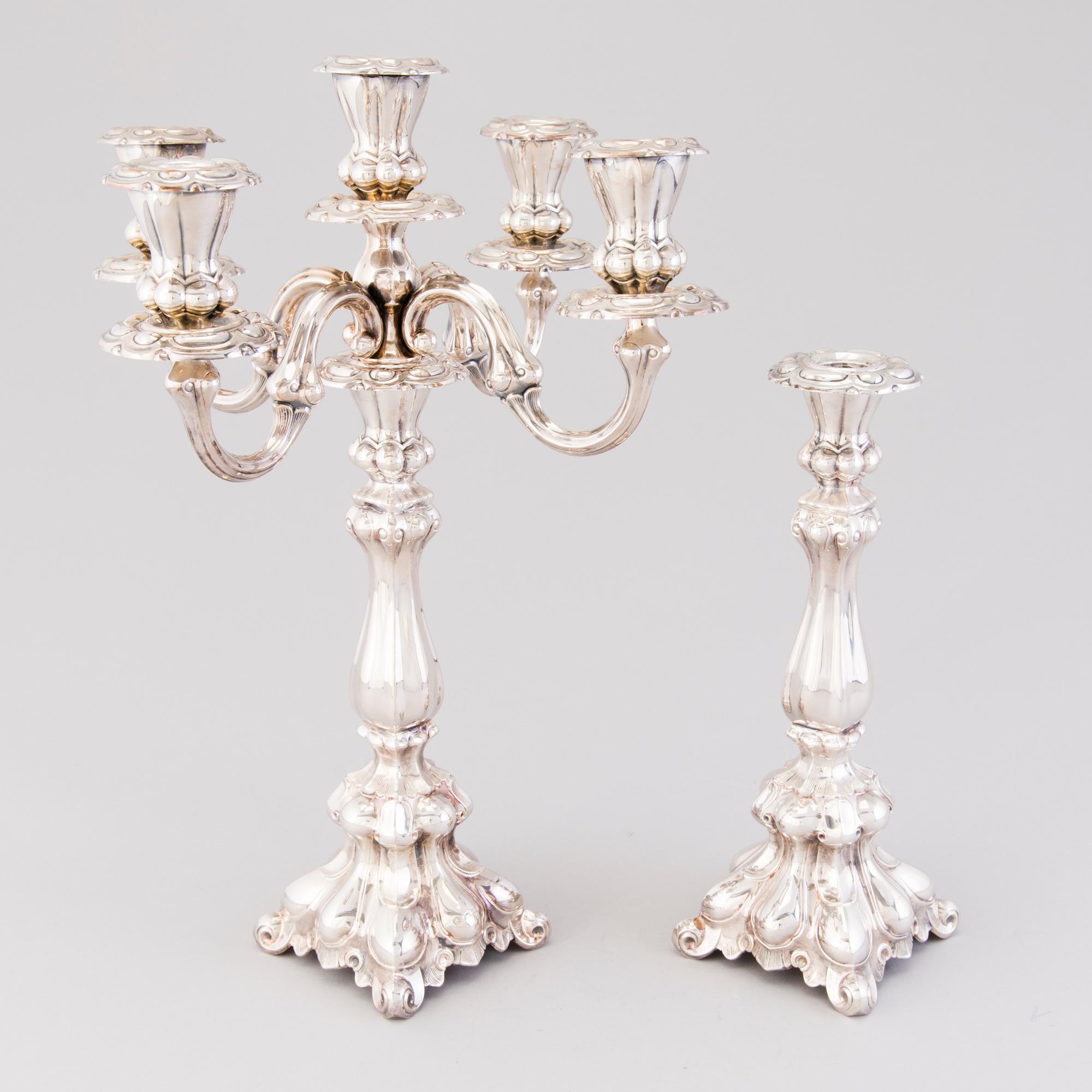 CANDELABRUM AND CANDLESTICK, silver, Kultakeskus Oy, Hämeenlinna, 1965 and 1975.
