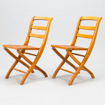 A pair of French folding chairs, Grange, latter half of the 20th century.