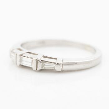 Platinum ring with baguette-cut diamonds.
