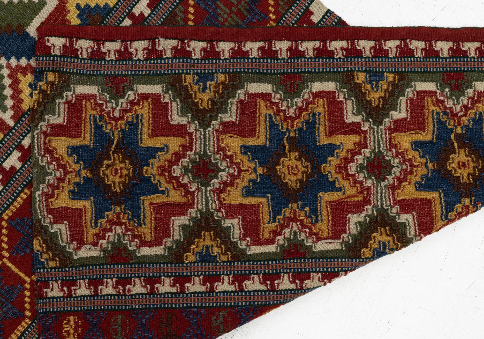 A bench cushion, flat weave, c. 262 x 64 cm, Scania, around the year 1900.