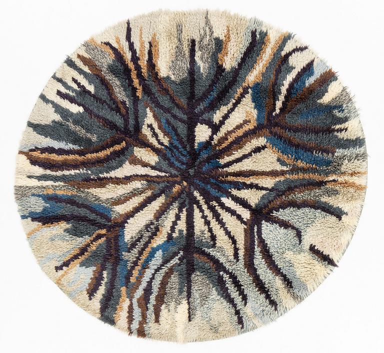 A knotted pile (rya) rug, diameter  180 - 190 cm.