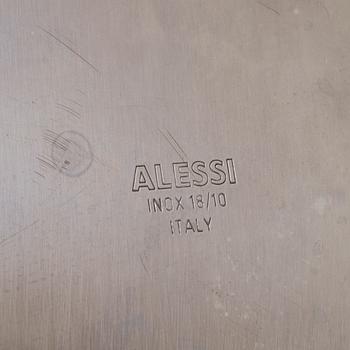 2 pieces of Alessi stainless steel table ware.