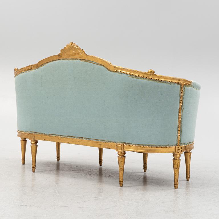 Karmstolar, ett par, samt soffa, Louis XVI-stil, omkring år 1900.
