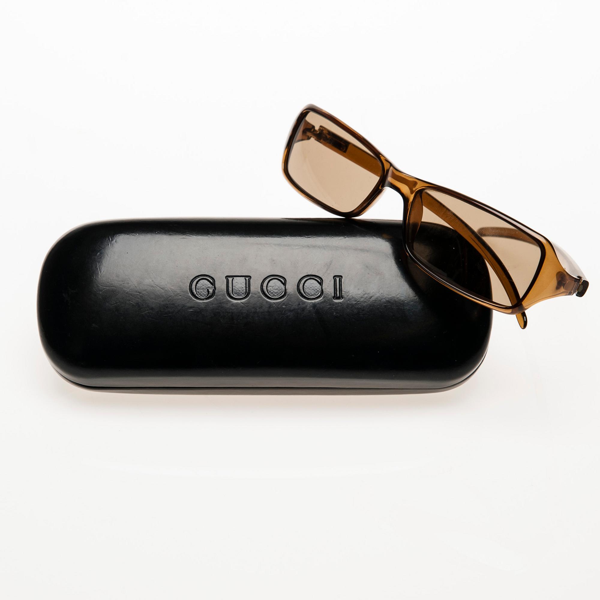 SOLGLASÖGON, Gucci.