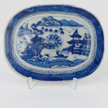 A blue and white tureen with cover, a plate and a butter tureen with cover and stand, China, 18th and 19th century.