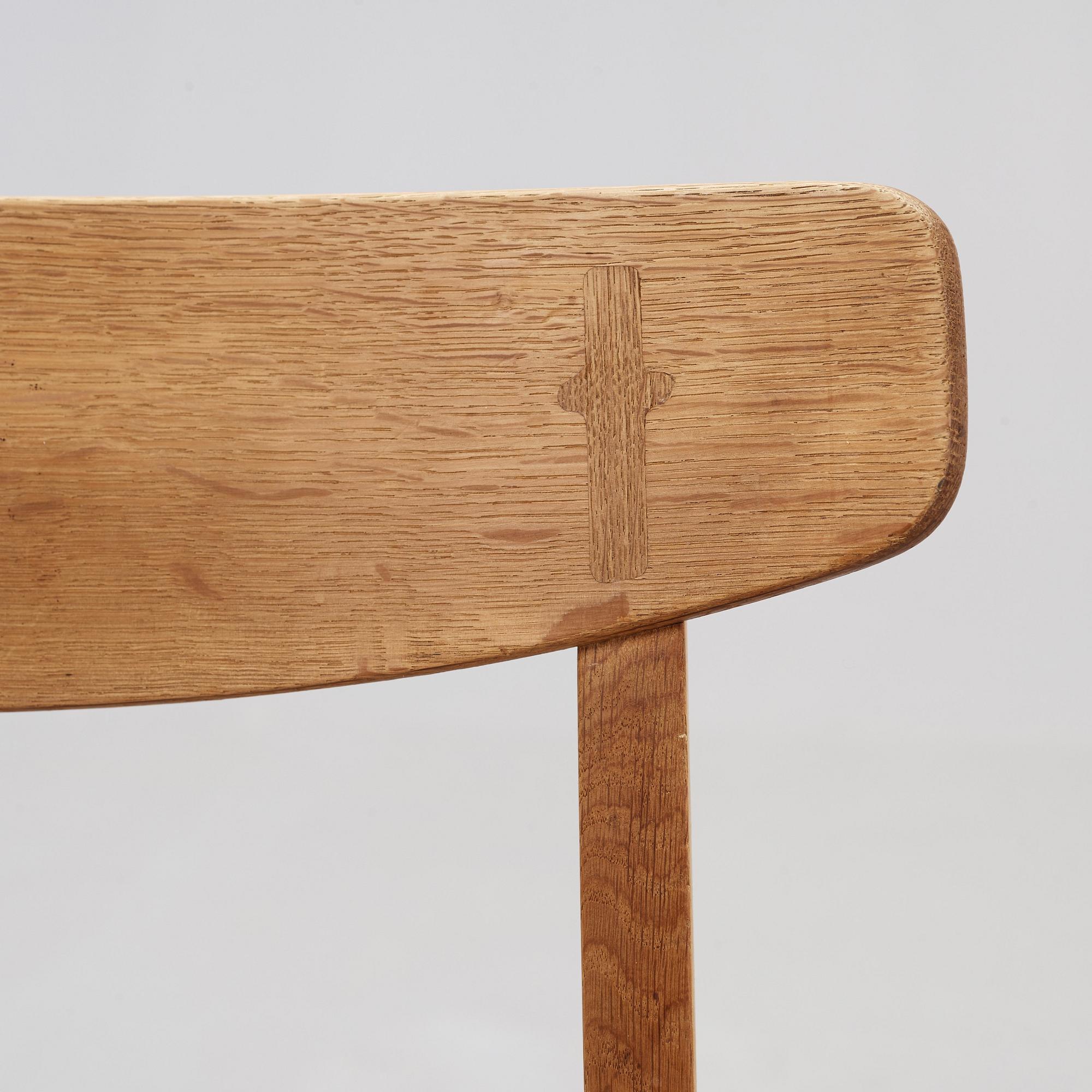 A set of six Hans J Wegner 'CH-23' oak dining chairs, Carl Hansen, Odense, Denmark.