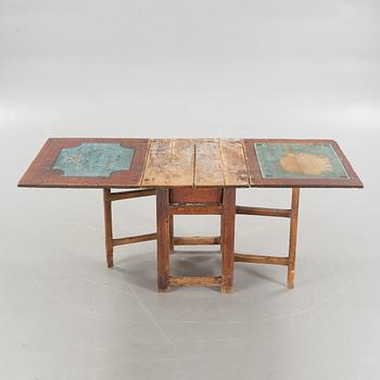 A mid 19th century gateleg table.