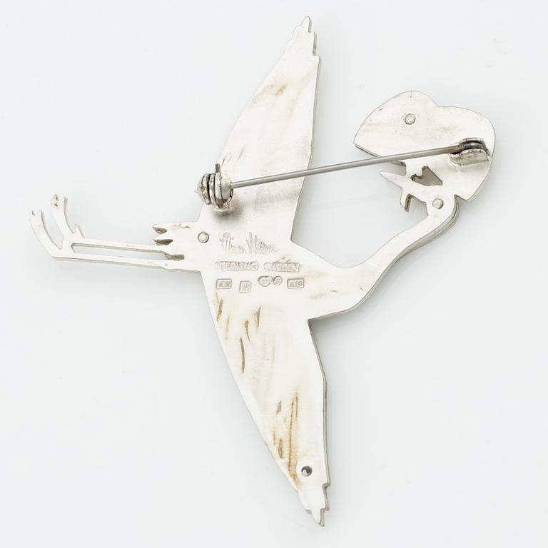 Wiwen Nilsson, brosch, sterlingsilver, i form av trana, Lund 1975.