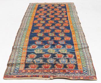 An Oriental runner carpet, circa 347 x 108 cm.