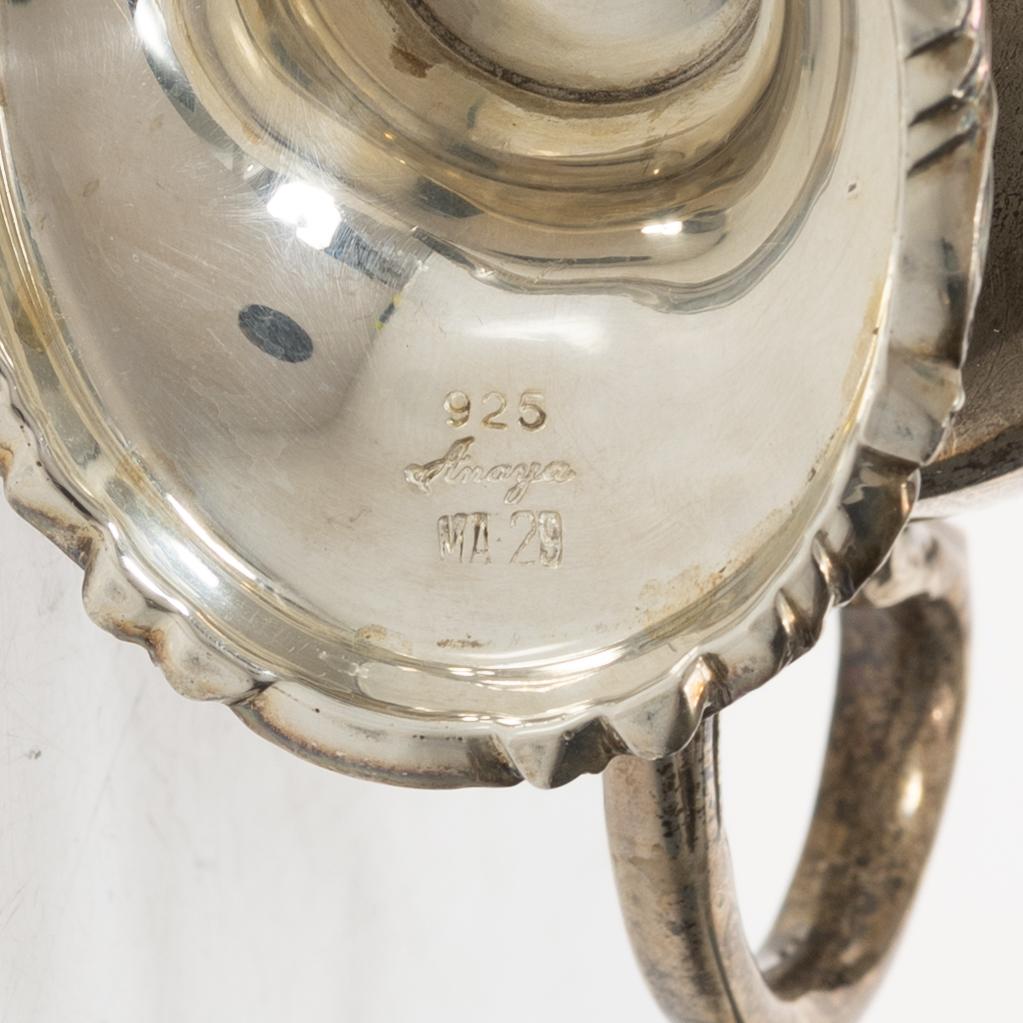 A silver sauceboat with tray and spoon, Anaya, Mexico, second half of the 20th Century.