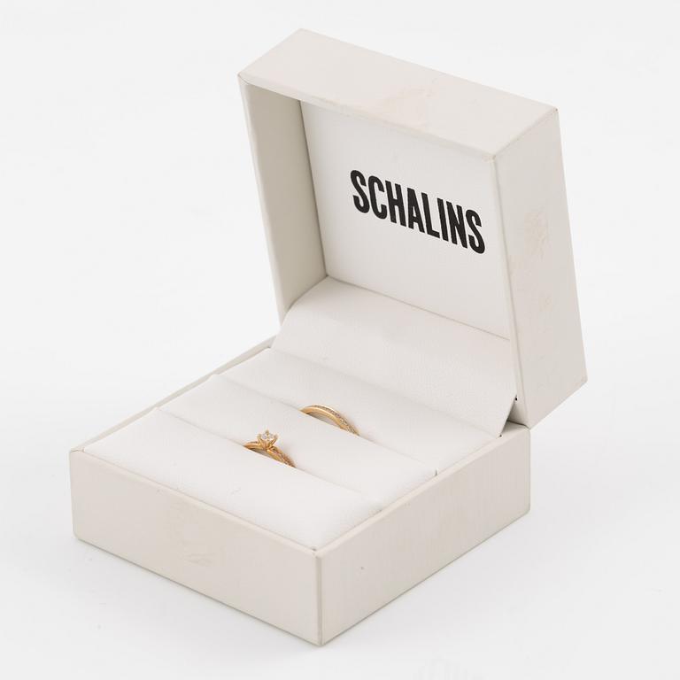Wedding rings, a pair, Schalins, 18K gold with brilliant-cut diamonds.