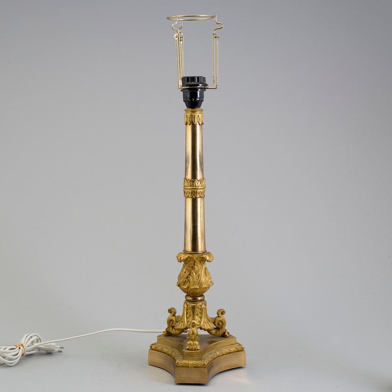 A LATE EMPIRE ORMOLU TABLE LAMP, mid 19th century.