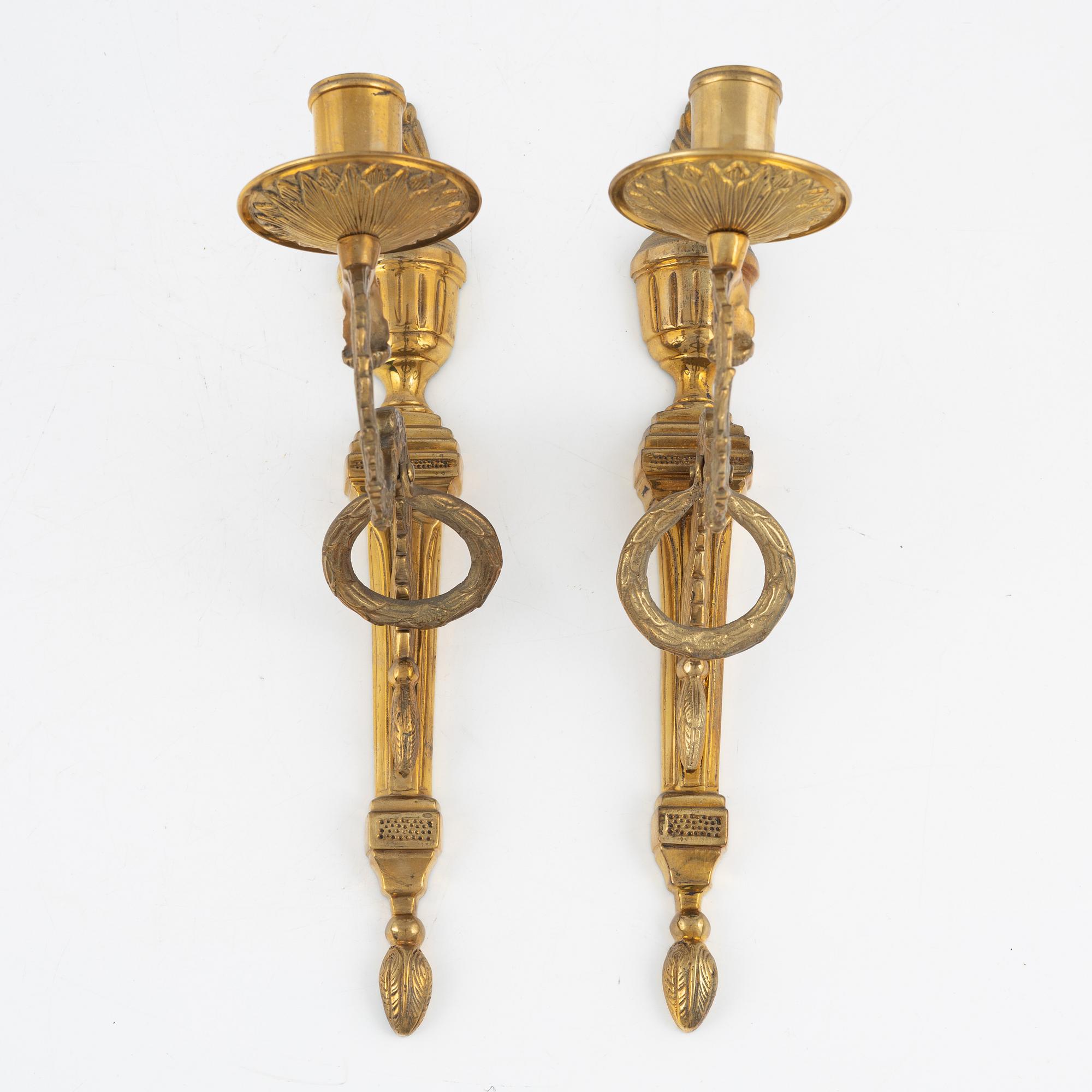 A pair of 'Törne' brass one-light wall ligths from IKEA's 18th Century collection.