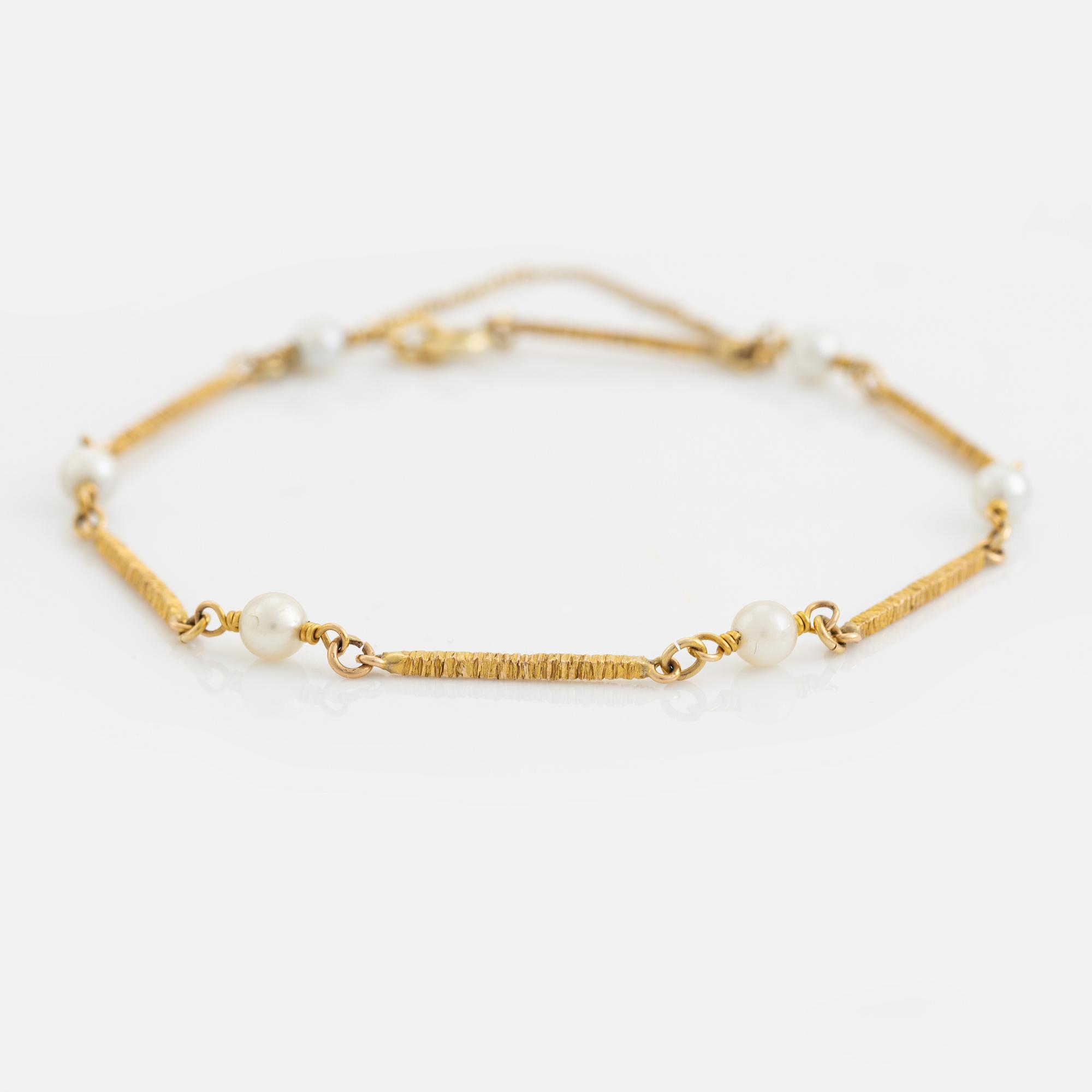 14K gold and pearl bracelet and necklace.