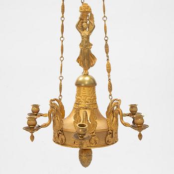 A presumably Italian Empire six-light ormolu chandelier, early 19th century.