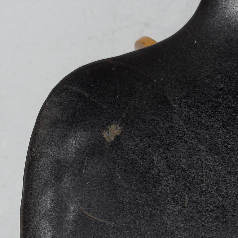 A 'Grand Prix' chair by Arne Jacobsen for Fritz Hansen, designed 1957.