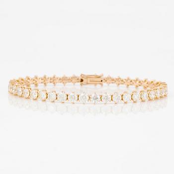 Tennisarmband 18K guld med briljantslipade diamanter.