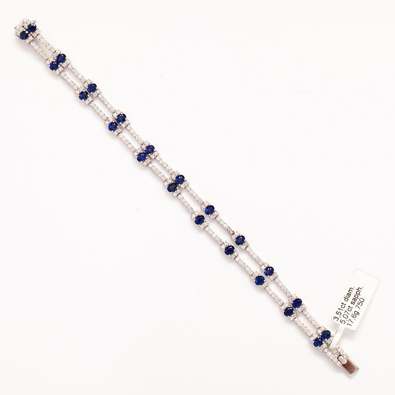 ARMBAND, 18K vitguld, saffirer ca 5.07 ct tot och diamanter ca 3.52 ct tot.