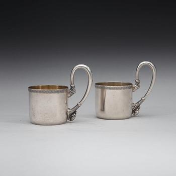 A pair of Russian 20th century parcel-gilt tea-glas holders, marks possibly of Vasily Andreyev, Moscow 1908-1917.