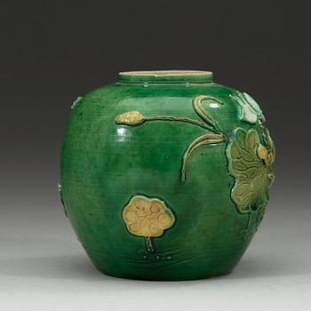 A green, aubergine and yellow glazed bisquit jar, Qing dynasty, 19th Century.