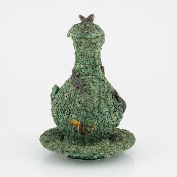 A majolica ewer with cover and stand, M. Mafra, Caldao, Portugal, late 19th Century.