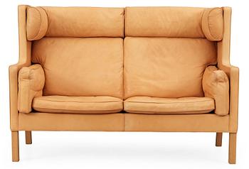 A Børge Mogensen 'Coupé / 2192' beige leather sofa, Fredericia, Denmark.