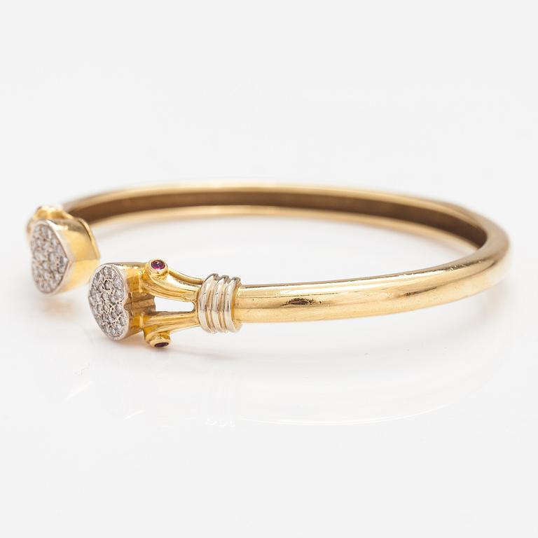 RANNEKORU, 14K kultaa, timantteja n. 0.24 ct yht ja rubiineja.