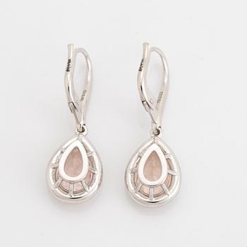 Pear shaped morganite and diamond earrings.