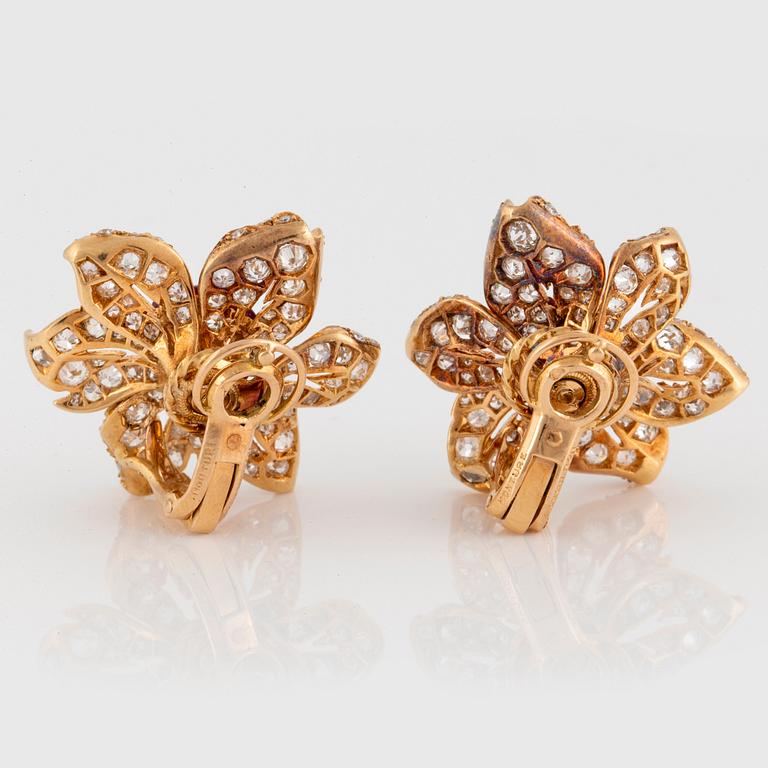 A pair of 18K gold earrings Monture Boucheron set with rubies and old- and eight-cut diamonds.