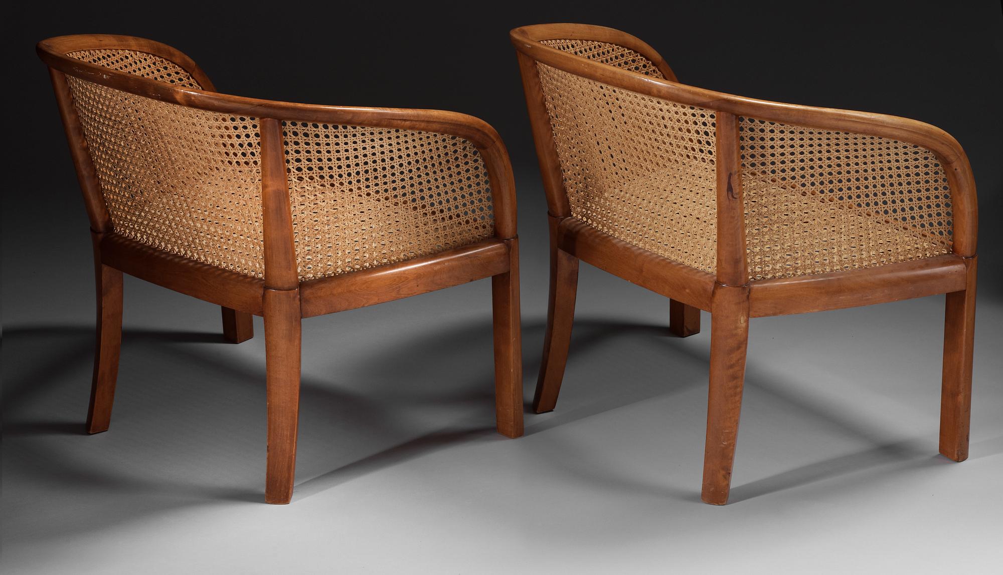 A pair of Carl Hörvik polished birch armchairs, Stockholm 1920.