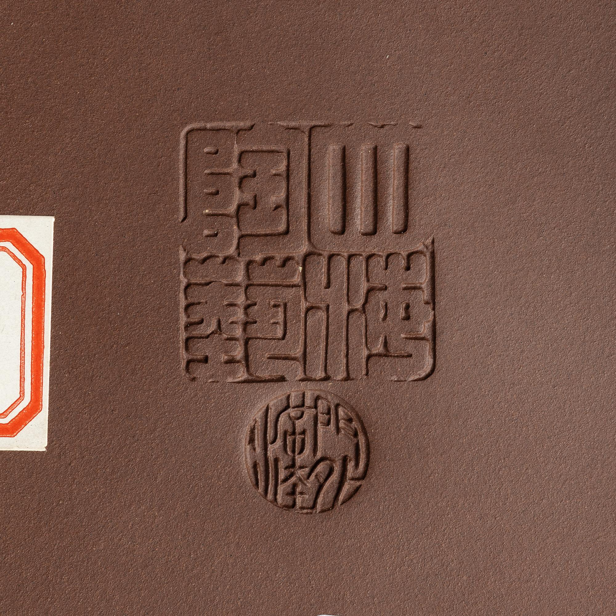 A group of three Chinese yixing teapots, 1980s.