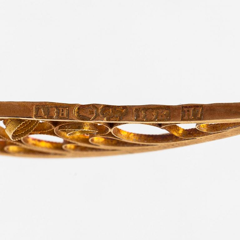 An 18K gold filigree necklace with seed pearls and a citrine, Stockholm 1910.