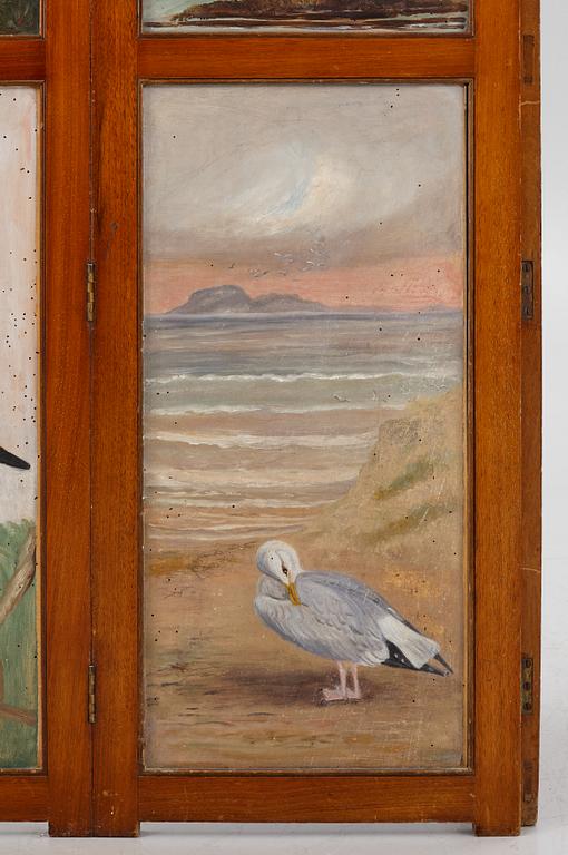 A folding screen, late 19th century.