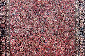 An antique Saber carpet, signed, a. 405 x 295 cm.