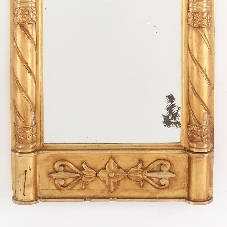 A first half of the 19th century Empire mirror.