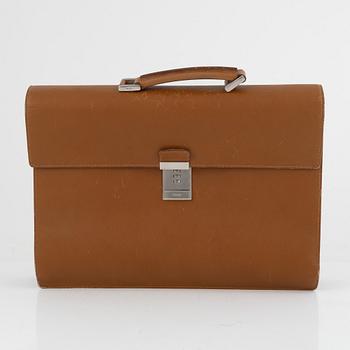 Prada, a briefcase.