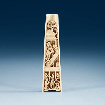 A carved ivory armrest, Qing dynasty.