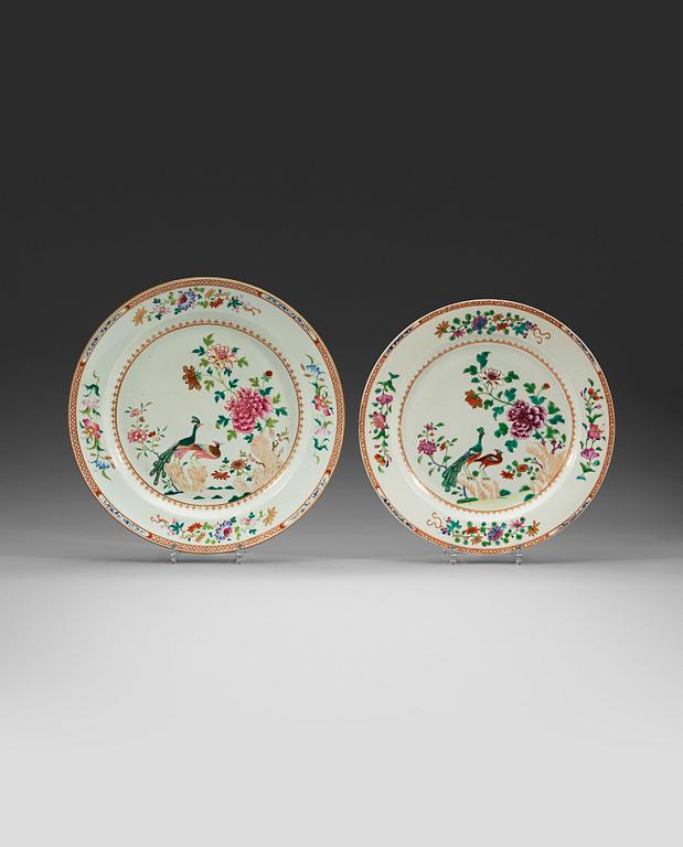 Two large famille rose 'double peacock' serving dishes, Qing dynasty, Qianlong (1736-95).