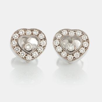 1072. A pair of Chopard "Happy diamonds" earrings in 18K white gold with round brilliant-cut diamonds.