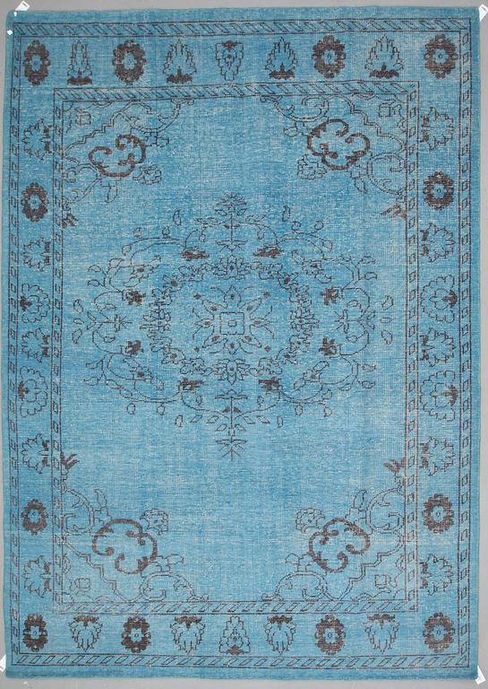An oriental carpet, ca 365 x 264 cm.