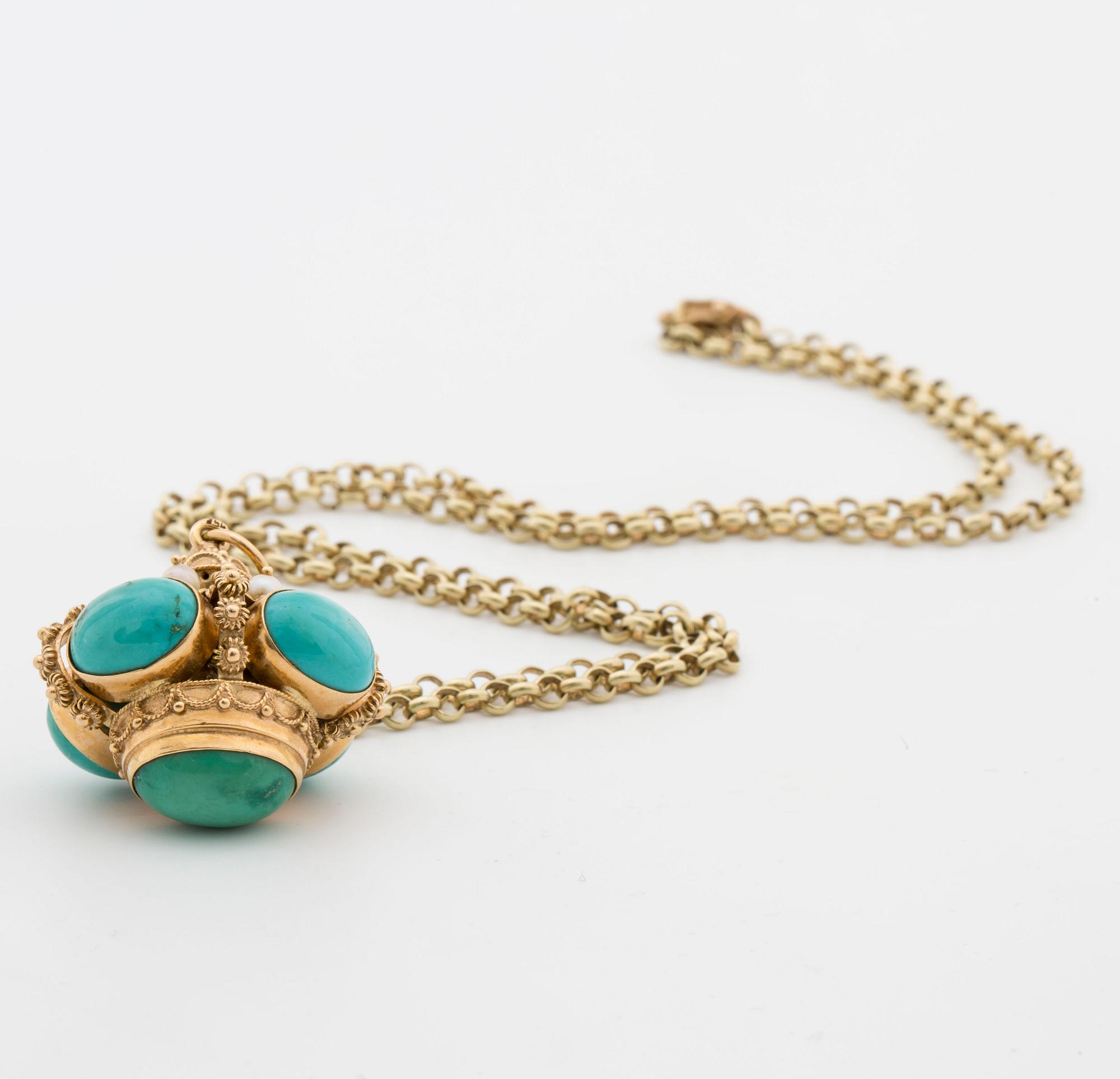 Pendant with chain, gold with turquoise and beads.
