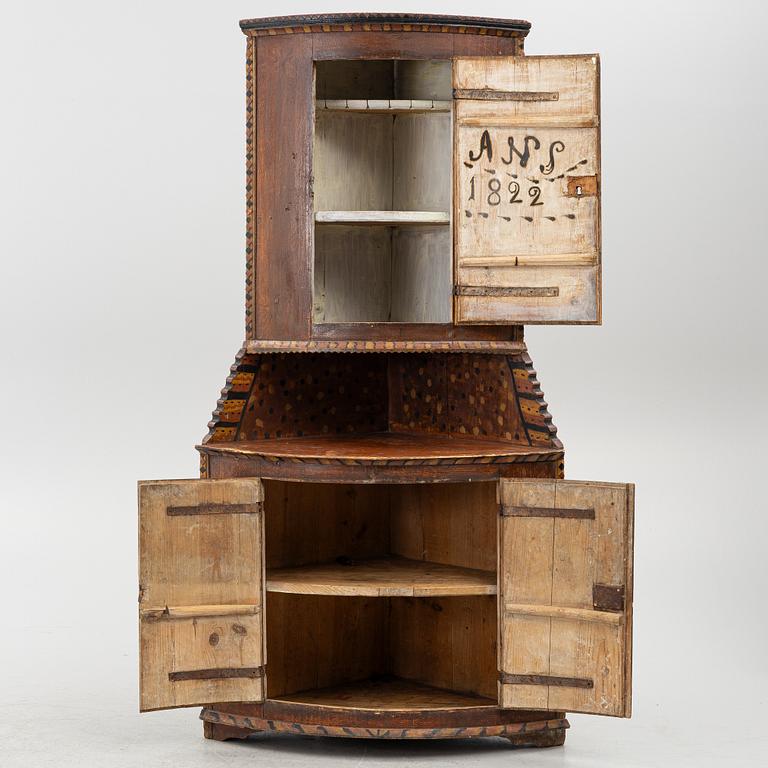 A corner cupboard, probably Värmland, dated 1822.