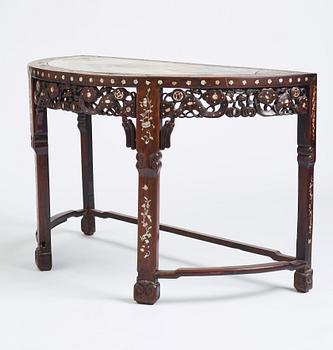 A Chinese hardwood demi-lune side table with mother-of-pearl inlays, late Qing dynasty.