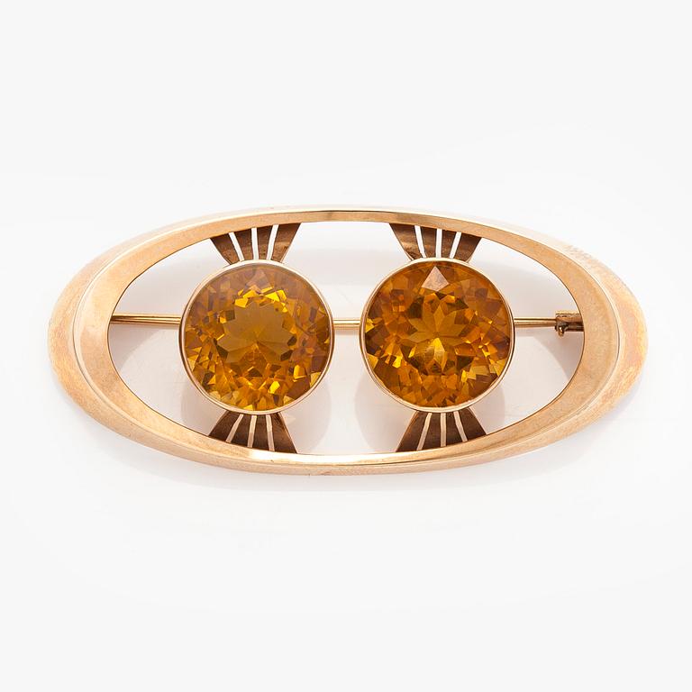 Brosch, 14K guld med citriner. Kaisaniemen Kello ja Kulta 1965.