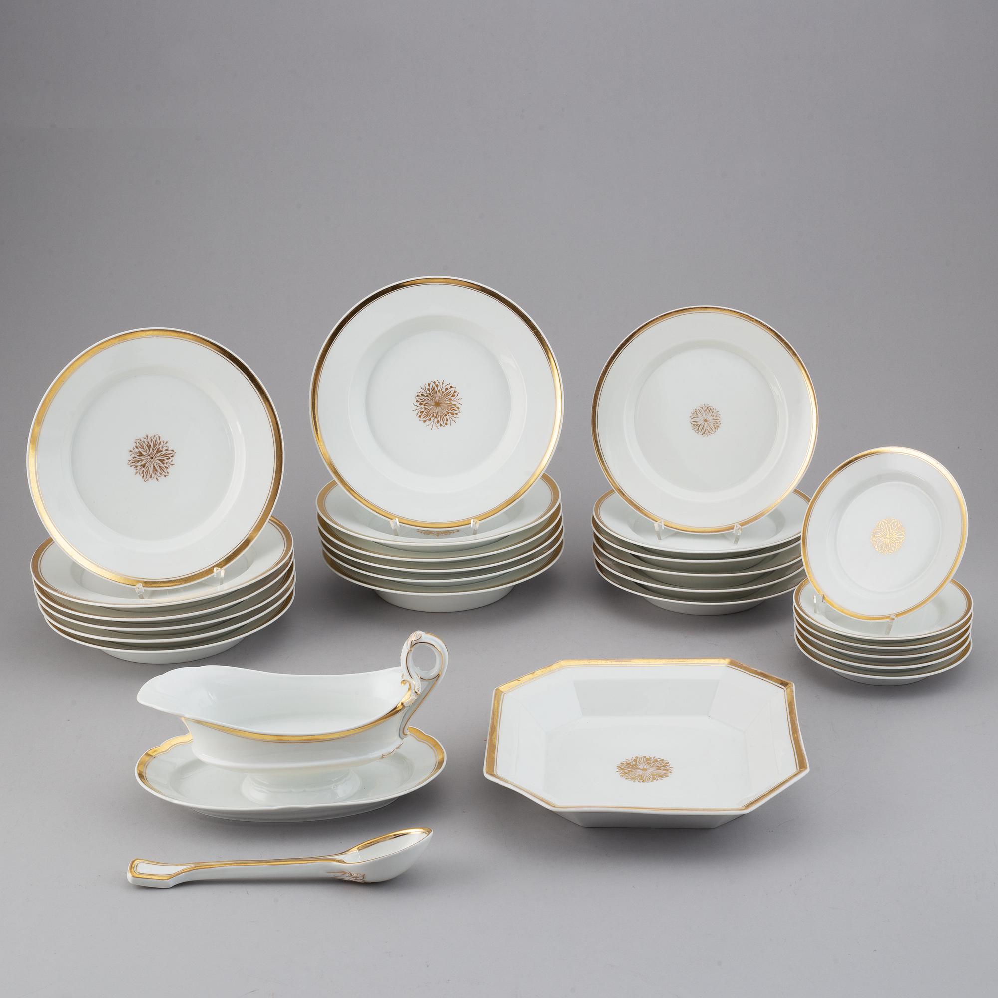 A 27 pcs 19th century KPM Berlin porcelain dinner service.