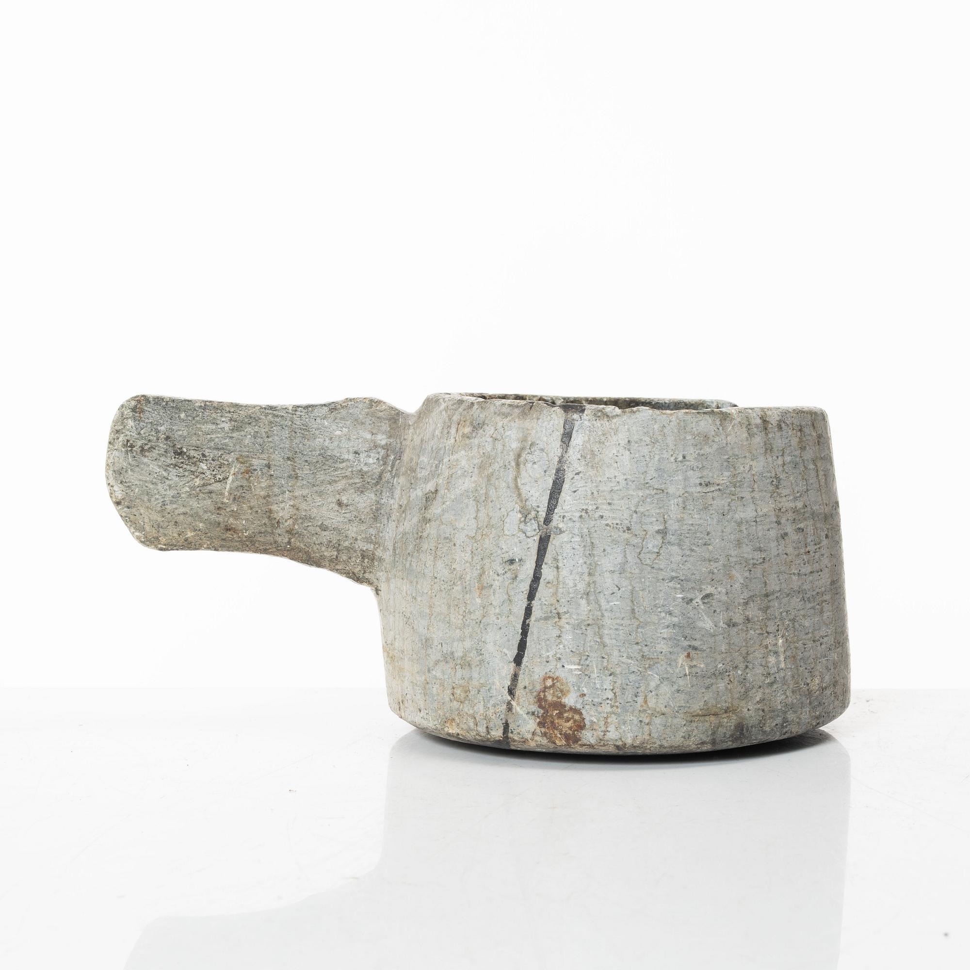 A Swedish carved soapstone jug, 19th century.