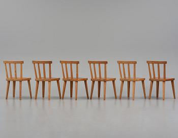 Axel Einar Hjorth, a set of six stained pine "Utö" chairs, Nordiska Kompaniet, Sweden, 1930s.