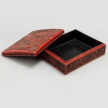 A large carved red lacquered box with cover, Qing dynasty, circa 1900.