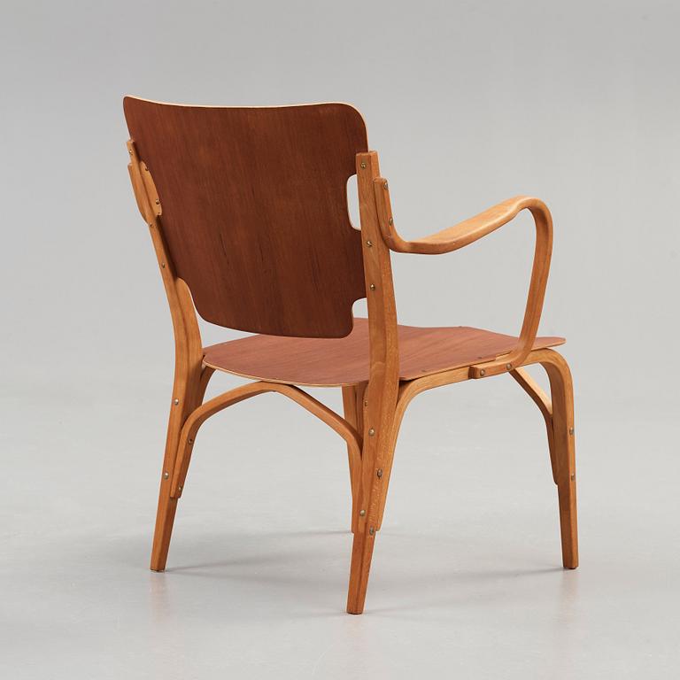 A Carl-Axel Acking beech and mahogany armchair, Svenska Möbelfabrikerna, Bodafors 1940's.